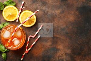 Iced tea drink with lemon and mint photo