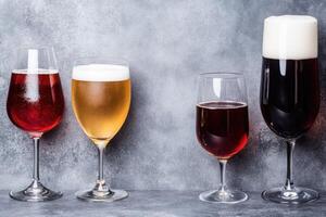 Variety of beers in different glasses photo