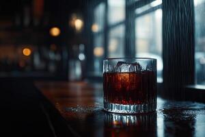 Dark cocktail on a bar photo