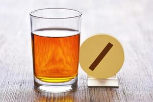 Alcoholic beverage and a pill reminder photo