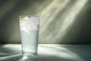 Refreshing iced drink in tall glass photo