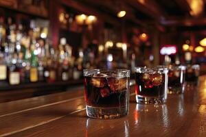Dark drinks on a bar top photo