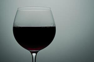 Close-up of a glass of red wine photo