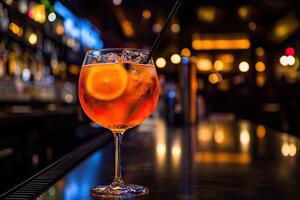 Orange cocktail on a bar photo