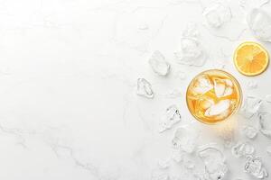 Refreshing iced tea drink on a marble surface photo