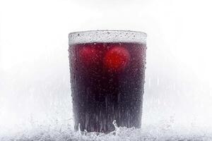Red drink with ice in a glass photo