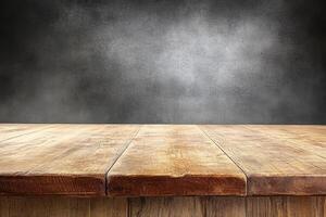 Wooden table top against a dark, textured wall photo