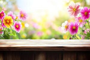Wooden table in a garden of colorful flowers. Sunlight filters through the blossoms, creating a vibrant and peaceful atmosphere photo
