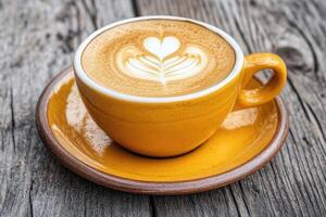 Aromatic, golden latte art on rustic wood photo