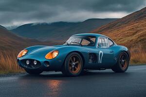 A sleek, vintage-style sports car on a mountain road photo