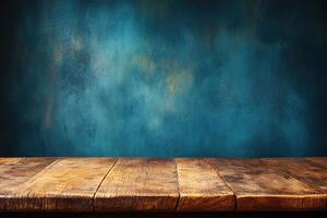 Rustic wooden table against teal backdrop photo
