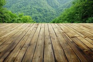Wooden deck overlooking lush green mountains photo