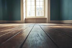 Empty room with sunlight shining on hardwood floor photo