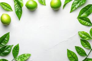 Fresh limes and leaves frame photo