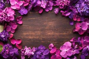 Floral Frame on Wooden Background photo