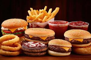 Delicious burgers, fries, and onion rings photo