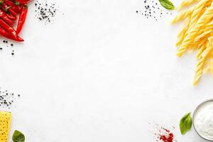 Food ingredients arranged on a white surface photo
