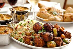 A lavish Indian feast, featuring a variety of dishes photo
