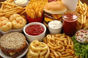 Fast food feast. A variety of unhealthy foods photo