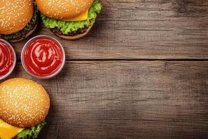 Delicious burgers and condiments on a rustic wooden surface photo