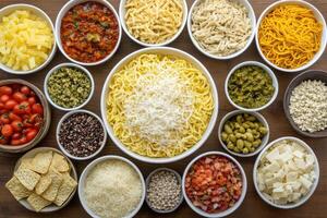 Assorted pasta and toppings photo