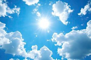 Sunny blue sky with fluffy clouds photo