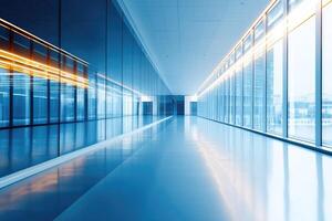 Modern, empty office hallway with large windows photo