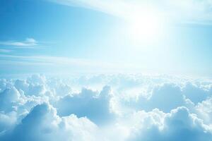 Vast expanse of fluffy clouds under a brilliant sky photo