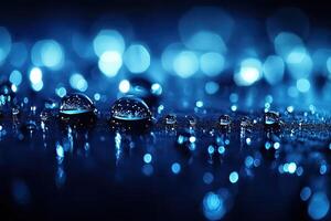 Water droplets reflecting blue lights photo