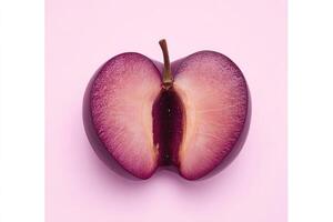 Deep crimson plum, halved, vibrant photo