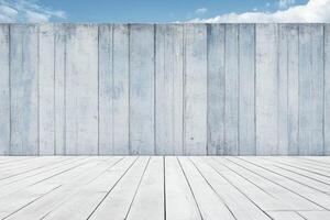Light gray wood panel wall and white wooden floor against a blue sky photo