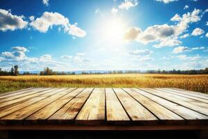 Rustic wooden surface overlooking a golden wheat field under a vibrant summer sky photo