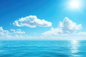 Vast, azure ocean meets a vibrant blue sky photo