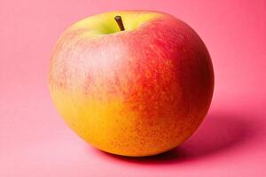 Close-up of a fresh apple. A round apple with a vibrant blend of red and yellow hues photo