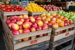 Fresh produce display in wooden crates photo
