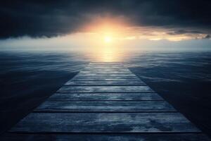 A wooden pier stretches into a mystical sunrise photo