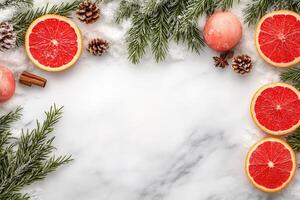 Festive fruit and spice border on marble photo
