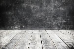 Empty room with a textured dark gray wall and light wooden floor photo