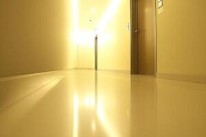 Empty, well-lit hallway with smooth floor photo