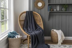 Cozy reading nook with wicker chair and blanket photo
