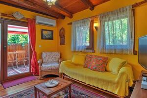 Cozy living room with patio access photo