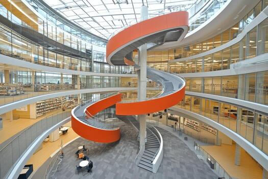 Modern library with a spiral staircase photo