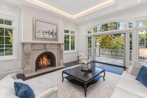 Luxurious living room with fireplace and patio access photo