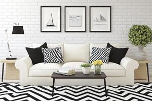 Modern, minimalist living room with a focus on clean lines and a monochrome color scheme. A crisp white sofa, black and white patterned accessories and art pieces create a sophisticated yet cozy atmosphere photo