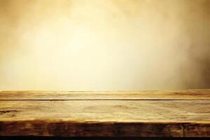 Rustic wooden table top against a warm, hazy backdrop photo