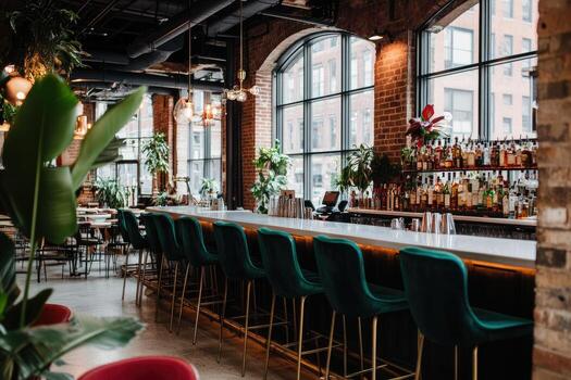Modern bar with exposed brick and lush greenery photo