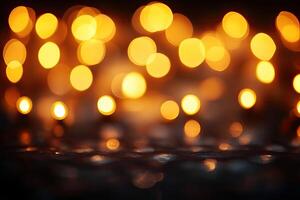Warm golden lights bokeh on a dark surface photo