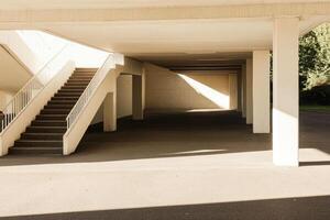 Modern, sunlit covered walkway photo