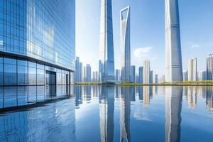 Modern city skyline reflected in a calm pool photo