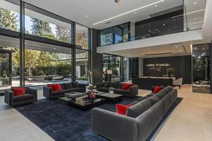Modern, open-plan living area with expansive views photo